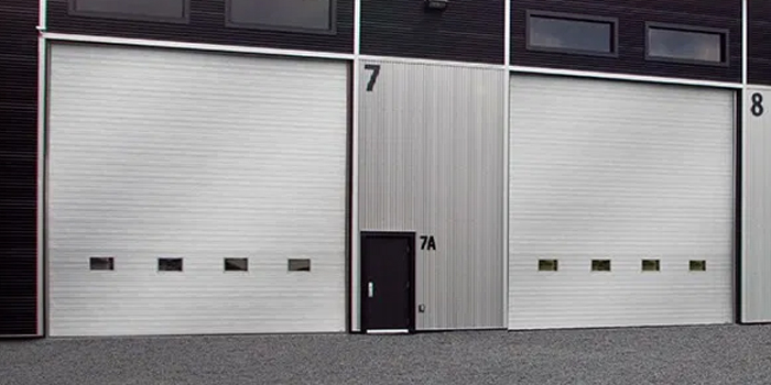 fix bent garage door in Fredricton